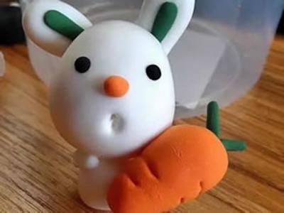 怎么用粘土做抱着胡萝卜的小白兔的方法图解