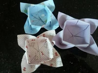 怎么折纸花朵形状盒子的折法图解