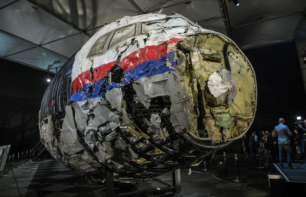 [新聞] 百年來最重大空難　4男涉擊落「馬航MH17